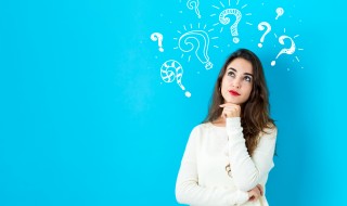 Question marks with young woman in a thoughtful face